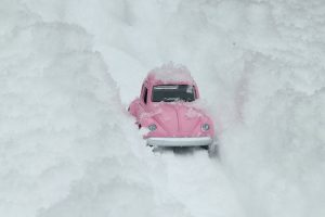 Pink car in the snow