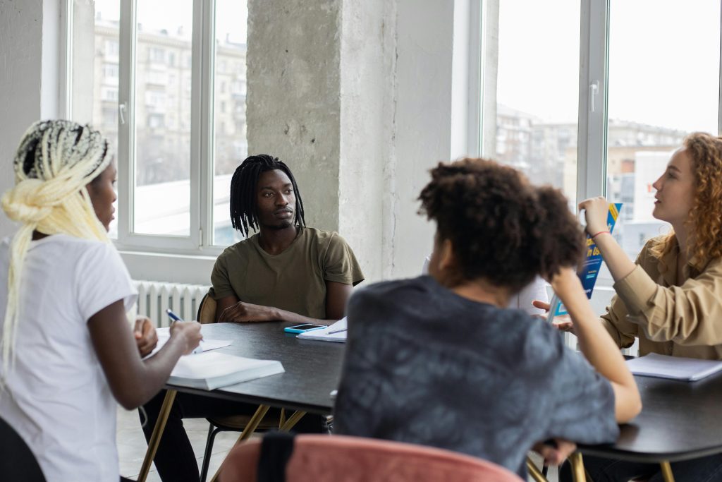 Students gathered around a table