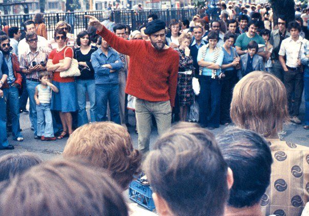 Orator speaking in front of a crowd