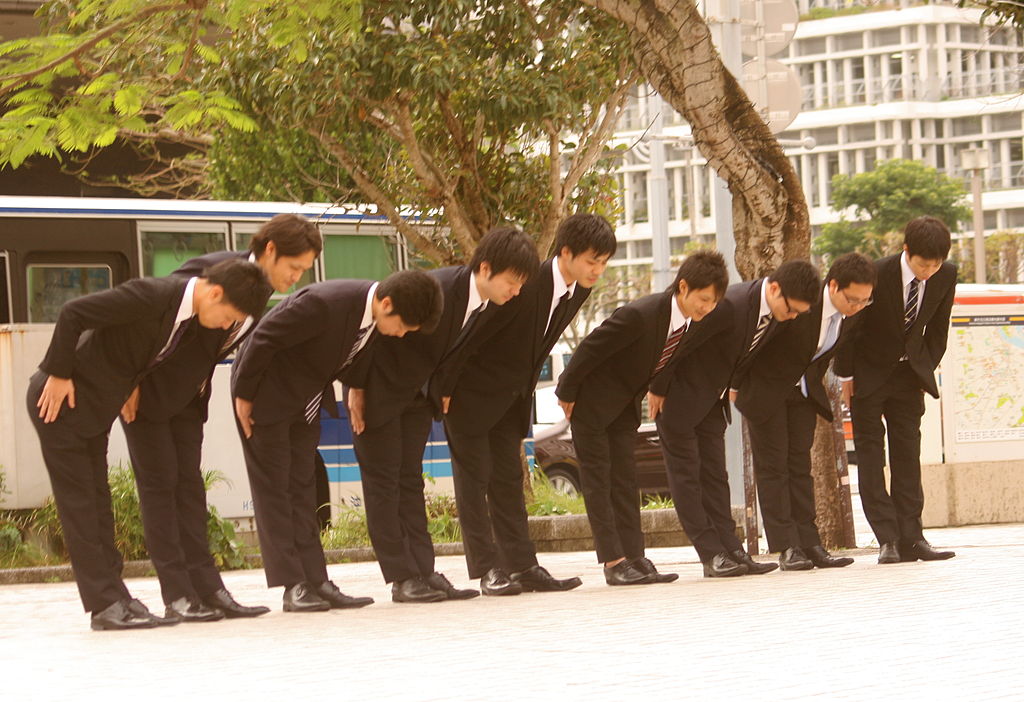 Japanese men bowing