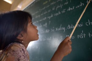 Vietnamese student learning the Kinh language.