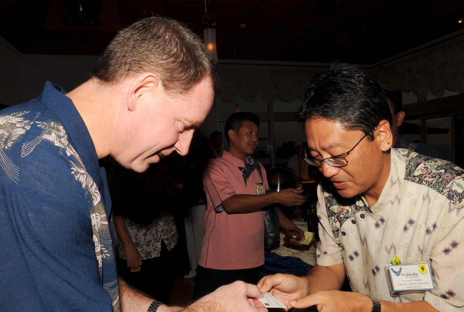 Men exchanging business cards