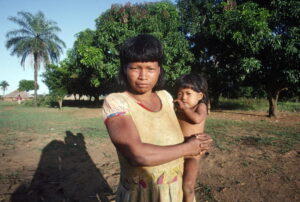 Xavante mother holding a child