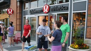 People outside of a Lululemon store