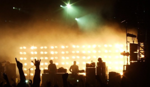 People at a concert with hands in the air